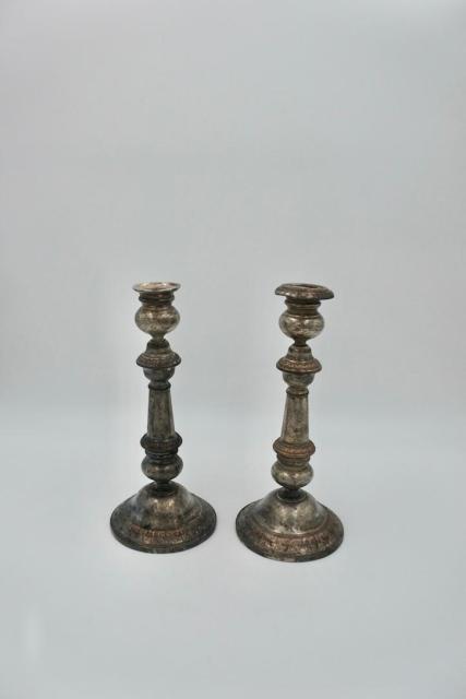 Pair of antique silver-plated brass candlesticks